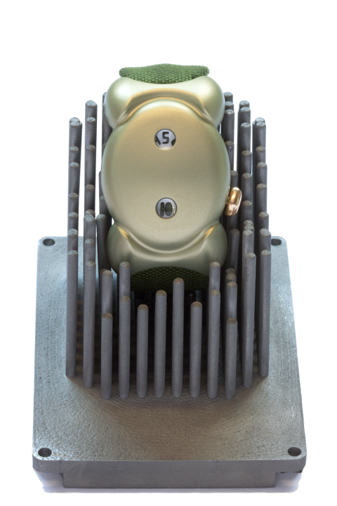 The Senno on its machined stainless steel display stand